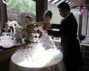 Keith and Carmen pouring Champagne